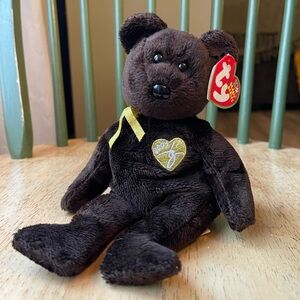 Brown Ty Beanie Baby with Yellow Ribbon— 2003 Signature